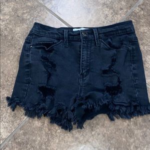 Black ripped shorts